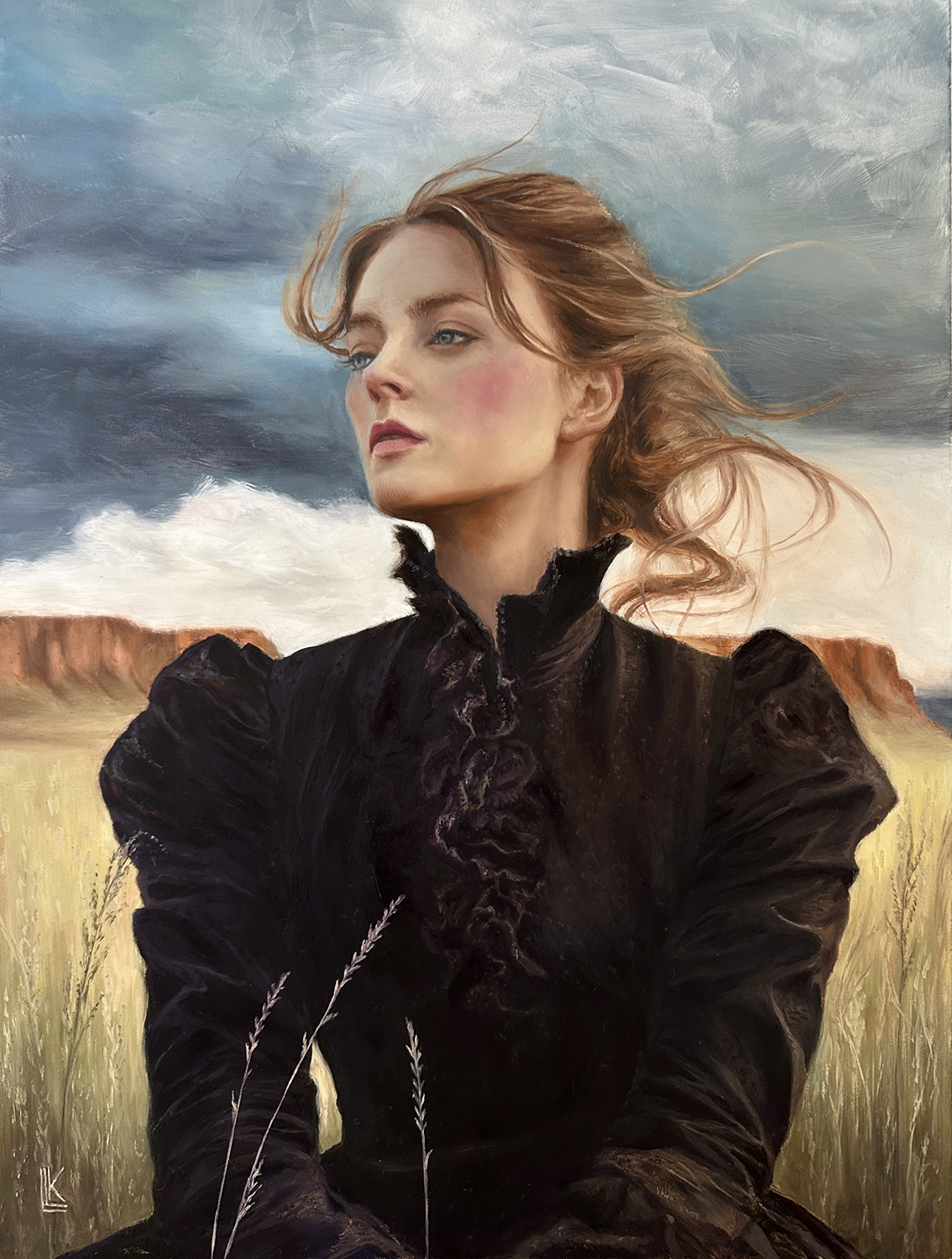 The Windweaver, young woman almost in profile view dressed in a black vintage 1890’s style blouse against the Vermillion Cliffs of Arizona while a storm approaches creating wind in her hair, 2025 oil painting on wood panel by Laura L. Krusemark